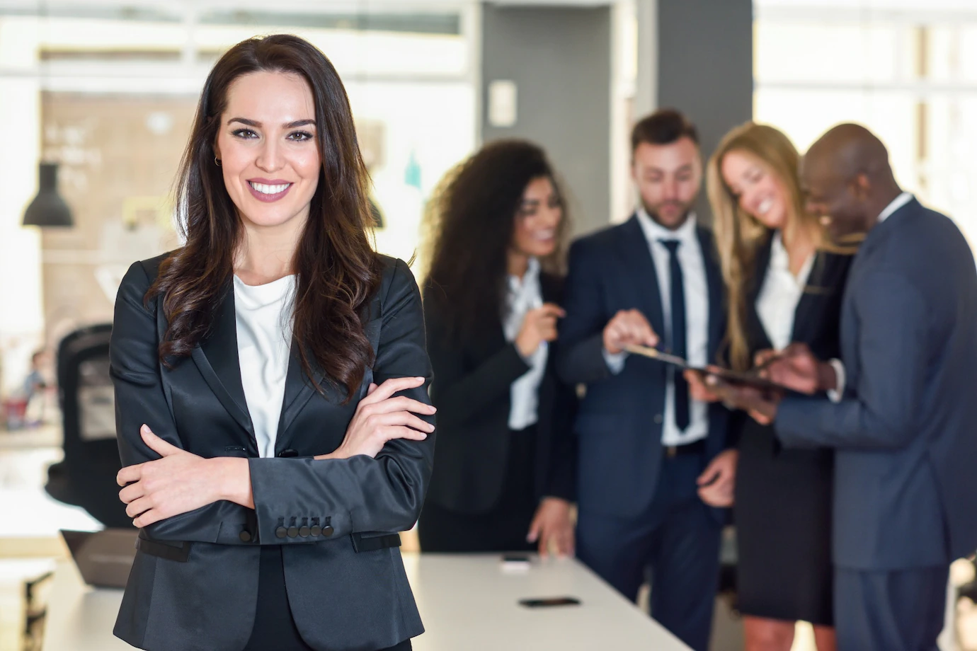 Woman standing front of the team